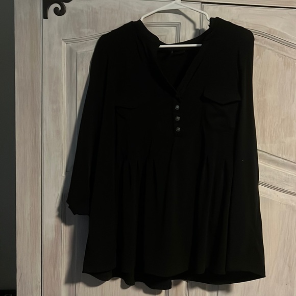 Do not fit anymore.  Thick black material shirt - Picture 1 of 4